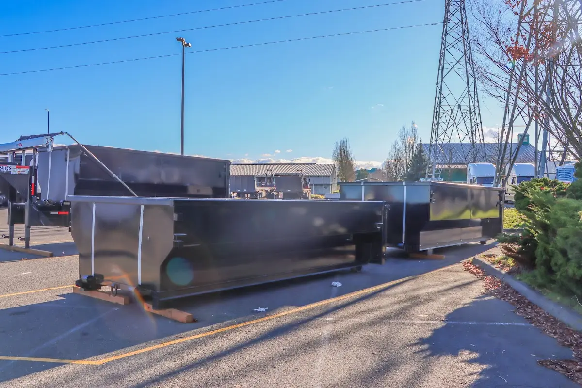 Roll-off dumpster ready for waste disposal at job site for 15 Yard Dumpster Rental in Dixon